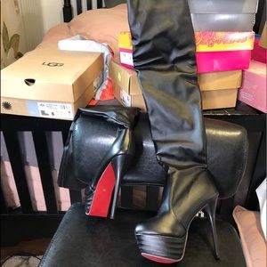 Thigh high leather heeled boots